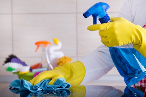 Cleaning technician treating a carpet stain during service