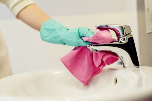 Local technician inspecting a pet urine stain in Harringay