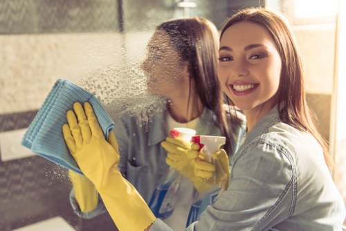 Kitchen domestic cleaning in Harringay with surfaces and appliances being wiped